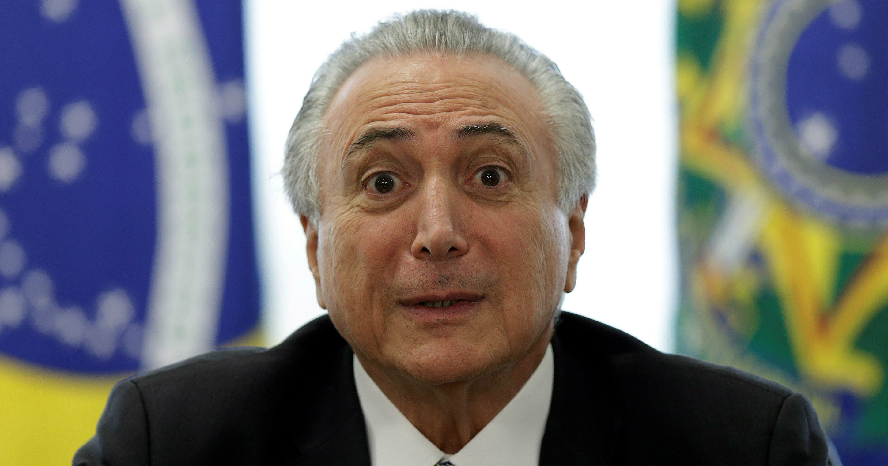Brazil's interim President Michel Temer reacts during a meeting with leaders of the Allied Base of parties in the Chamber of Deputies, at the Planalto Palace in Brasilia, Brazil, May 17, 2016.