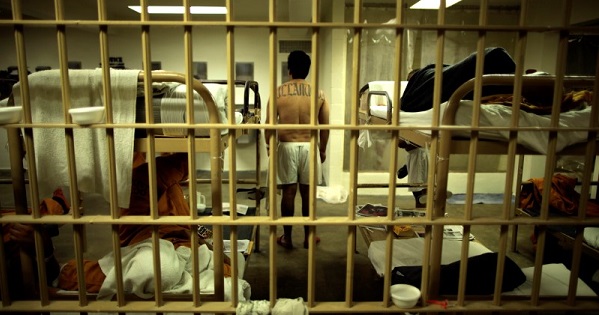 An inmate stands in his cell at the Orange County jail in Santa Ana, California.