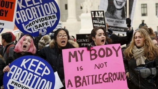 Pro-abortion supporters demonstrate in front of the U.S. Supreme Court (not pictured) during the National March for Life rally in Washington.