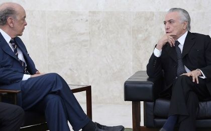 Brazil's interim President Michel Temer (R) and his Foreign Minister Jose Serra attend a credentials presentation ceremony of several new diplomats, at Planalto Palace in Brasilia.