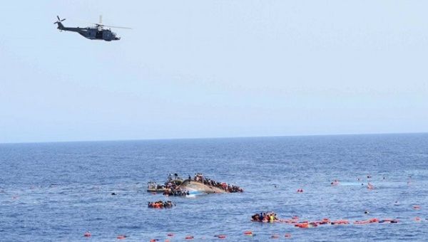  Italian navy ships rescue people from the overturned boat