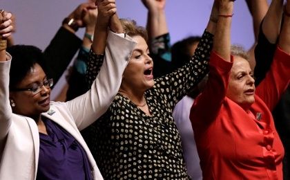 Former Brazilian Minister of Women, Racial Equality, and Human Rights Nilma Lino Gomes (L) joined hands with suspended President Dilma Rousseff, May 10, 2016.