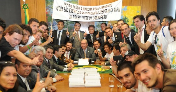 Members of the Free Brazil Movement pose for a photo after meeting with the former head of the lower chamber of Congress, Eduardo Cunha.