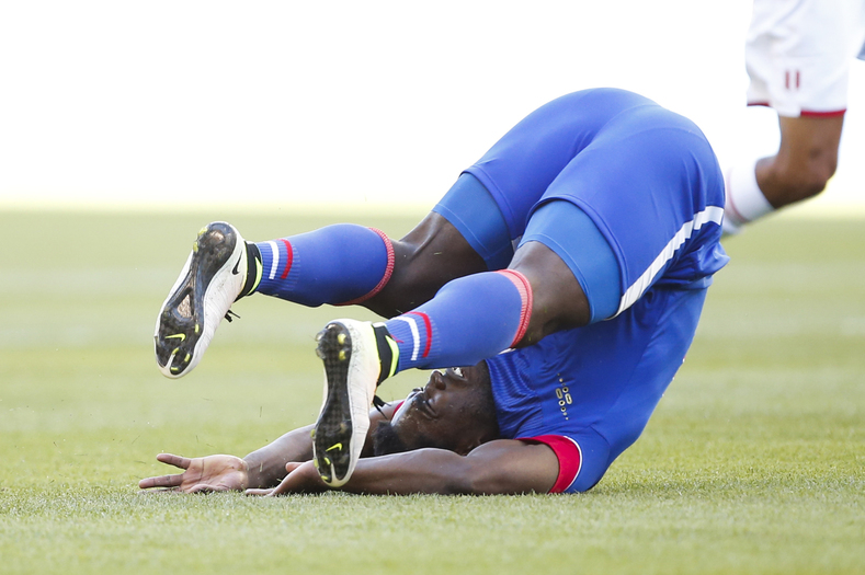 Haiti forward Jeff Louis (10) tumbles to the ground during the first half against Peru of the group play stage of the 2016 Copa America Centenario at Century Link Field.