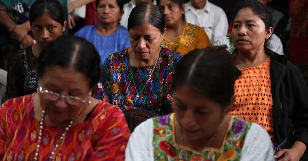 Widows of victims of the civil war attend a hearing announcing that eight former officers will be sent to trial, Guatemala City, June 7, 2016.