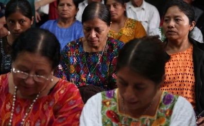 Widows of victims of the civil war attend a hearing announcing that eight former officers will be sent to trial, Guatemala City, June 7, 2016.