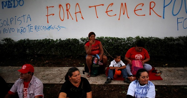 A sit-in protest against Brazil's interim president where the phrase on the wall reads 