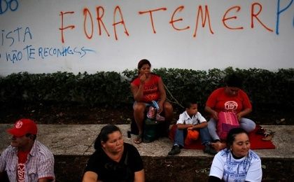 A sit-in protest against Brazil's interim president where the phrase on the wall reads 