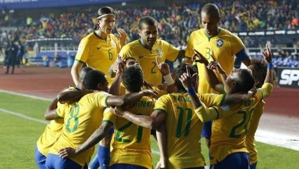 Brazil players celebrate a goal in the Copa America 2015 quarter-final against Paraguay in Chile, June 27, 2015. 
