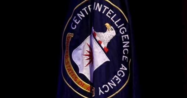 The CIA flag is displayed on stage during a conference on national security.