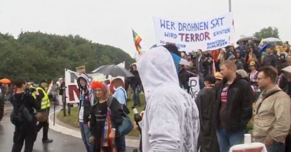 Several thousand demonstrators form a human chain outside Ramstein U.S. Air Force base in Germany to protest against U.S. drone operations.
