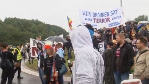 Several thousand demonstrators form a human chain outside Ramstein U.S. Air Force base in Germany to protest against U.S. drone operations.