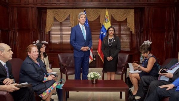 U.S. Secretary of State Kerry next to Venezuelan Foreign Minister Rodriguez in Santo Domingo