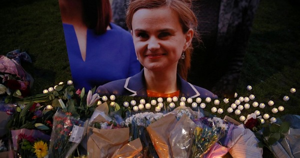 Tributes for Labour Party MP Jo Cox, who was shot dead in the street in northern England, are displayed on Parliament Square in London, Britain, June 16, 2016.