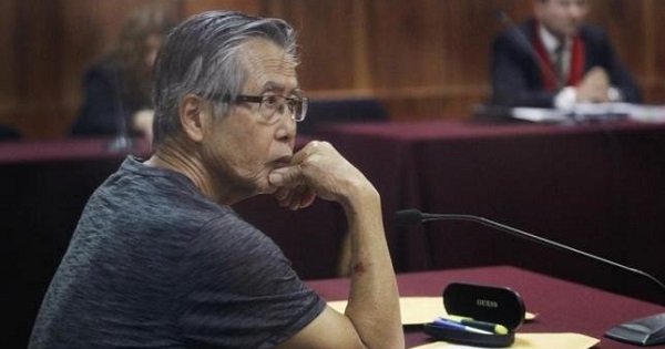 Peru's former President Alberto Fujimori sits in court during the sentencing in his trial on charges of embezzling state funds to manipulate the media during his tenure as president, in Lima January 8, 2015.