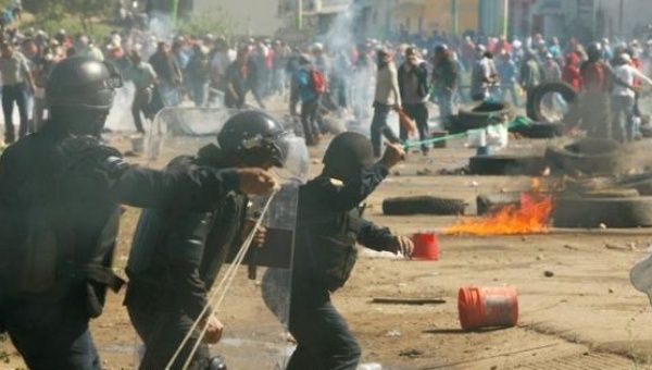 Police kill six and leave at least 51 wounded in the state of Oaxaca.