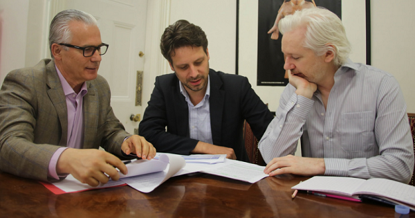 Ecuador's Foreign Minister Guillaume Long (C) meets with Julian Assange and his lawyer in the Ecuadorean Embassy in London, June 19, 2016.