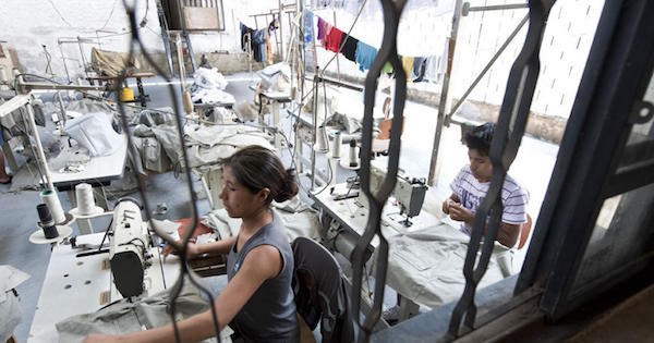 Bolivian immigrants work at a clothing factory in Nova Odessa, Brazil, on Oct. 11, 2011.