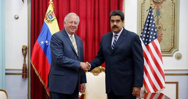 Venezuela's President Nicolas Maduro shakes hands with U.S. diplomat Thomas Shannon during their meeting at Miraflores Palace in Caracas, June 22, 2016.