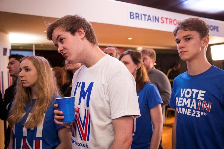 Supporters of the Stronger In Campaign react after hearing the result in the EU referendum in London. 