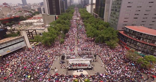 Tens of thousands gather at the Independence Angel monument, in Mexico City, in a protest in support of the Oaxaca teachers.
