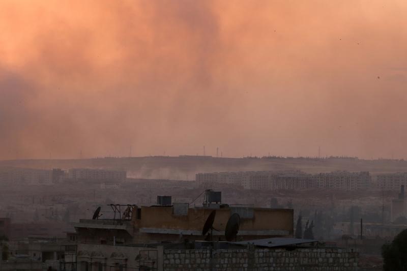 Smoke rises after airstrikes on Aleppo's Castello road, Syria.