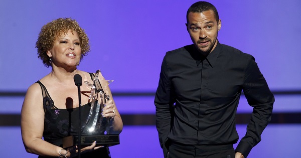 Chairman and CEO of BET Debra Lee presents the Humanitarian Award to actor Jesse Williams during the BET Awards in Los Angeles, California June 26, 2016.