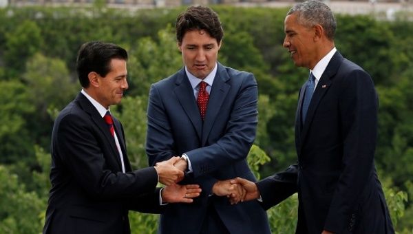 (L-R) Mexico's President Enrique Pena Nieto, Canada's Prime Minister Justin Trudeau and U.S. President Barack Obama at the 