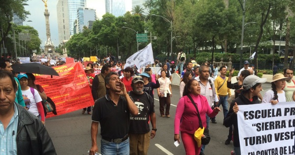 Striking teachers take part in the mega-march held in central Mexico City.