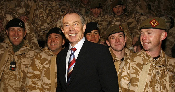 Britain's Prime Minister Tony Blair (C) visits British troops in Basra, southern Iraq.