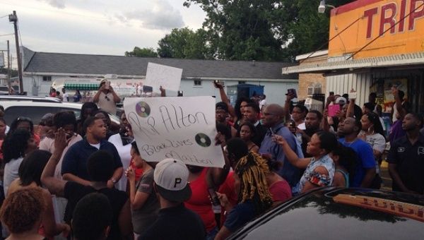 More than a hundred people gathered outside the store where Alton Sterling shot.