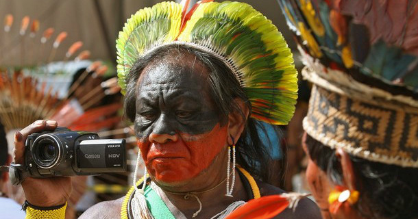 A native videoes the indigenous march “S.O.S Amazon” staged to bring attention to saving the Amazon forest, in Belem, Para, in the heart of the Brazilian Amazon, on January 27, 2009.