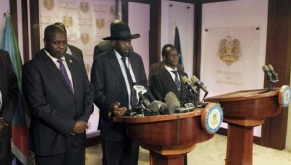 South Sudan President Salva Kiir (C), and rebel leader Riek Machar (L) and other government officials, addresses a news conference at the Presidential State House in Juba, South Sudan, July 8, 2016.