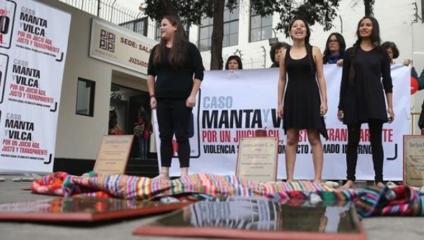 Human rights activist demonstrate in support of justice for victims of sexual violence during Peru's armed conflict in Lima, July 8, 2016.  