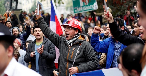 Hundreds of thousands of Chileans marched in over a dozen cities, including the capital Santiago, to demand an end to the country's private pension system, July 24, 2016.