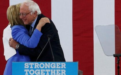 Democratic U.S. presidential candidate Hillary Clinton and Senator Bernie Sanders embrace during a campaign rally where Sanders endorsed Clinton in Portsmouth, New Hampshire, U.S., July 12, 2016.