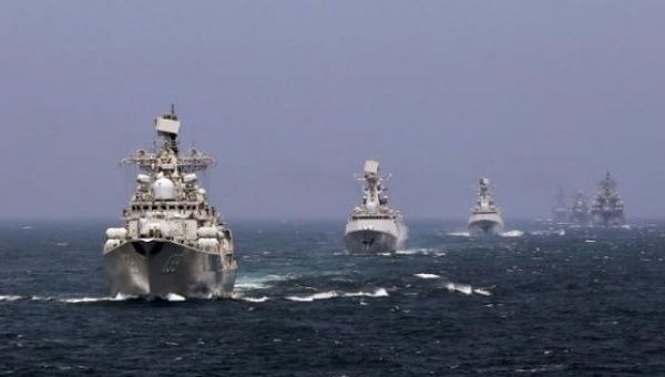 Chinese and Russian naval vessels participate in the Joint Sea 2014 naval drill outside Shanghai, May 24, 2014.
