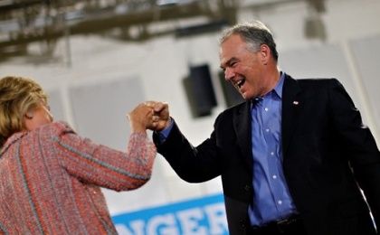 Democratic U.S. presidential candidate Hillary Clinton and Senator Tim Kaine react during a campaign rally in Annandale, Virginia, July 14, 2016.