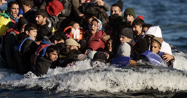 Refugees and migrants arrive on the Greek island of Lesbos.