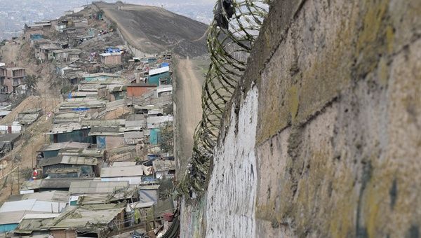 Residents on the poor side have to travel an hour to bypass the wall.