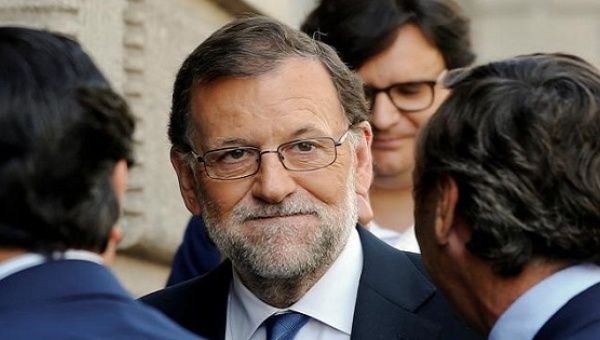 Spain's acting Prime Minister Mariano Rajoy arrives at the parliament in Madrid, Spain August 28, 2016. 
