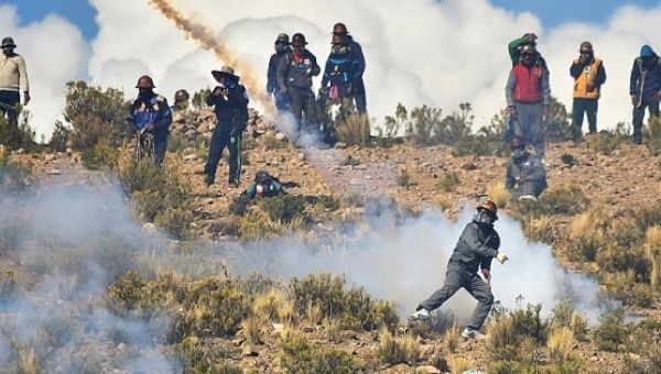 Miners clash with Bolivian police in Panduro, south of La Paz, Bolivia, Aug. 25, 2016.