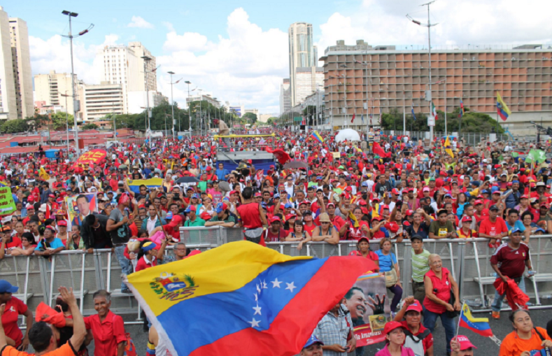 Thousands of people flooded down the Avenida Bolivar to the center of Caracas.