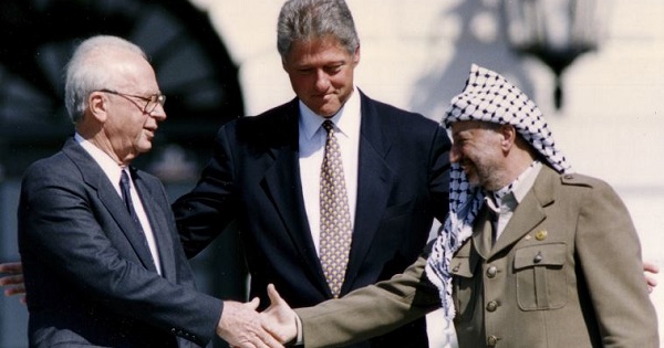 File photo of U.S. President Clinton with Israeli Prime Minister Rabin and PLO President Yasser Arafat