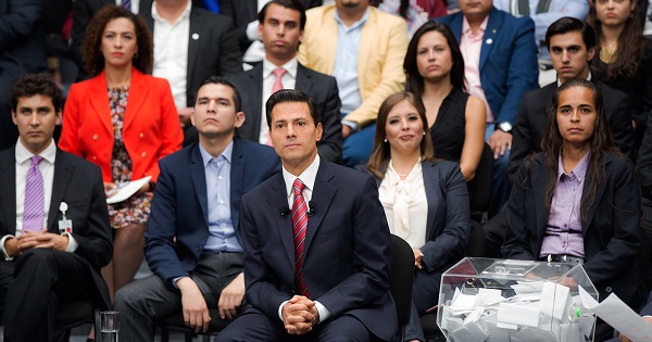 Mexican President Enrique Peña Nieto listens as a question is posed to him during a town-hall session with youth from throughout the country, Mexico City, September 1, 2016.