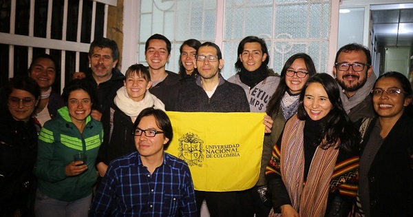 Miguel Angel Beltran poses with the flag of the National University alongside students and supporters shortly after his release from prison, Bogota, Colombia, September 1, 2016.