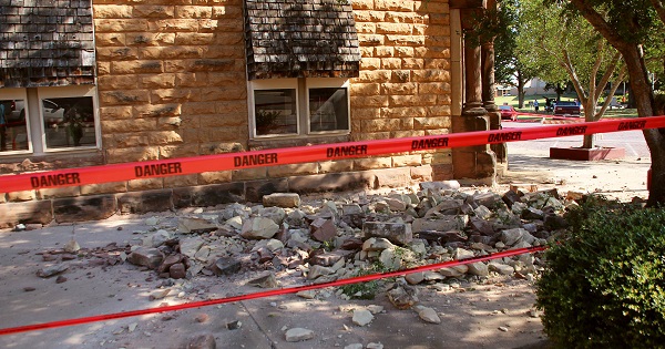 Stonework litters a sidewalk in Pawnee City, Oklahoma after a 5.6 earthquake struck, Sept. 3, 2016.