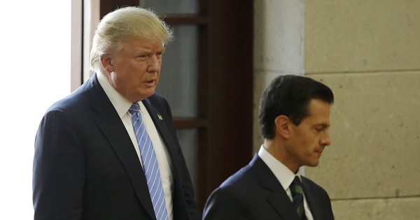 U.S. Republican presidential nominee Donald Trump and Mexico's President Enrique Pena Nieto arrive for a press conference in Mexico City, Mexico, August 31, 2016.