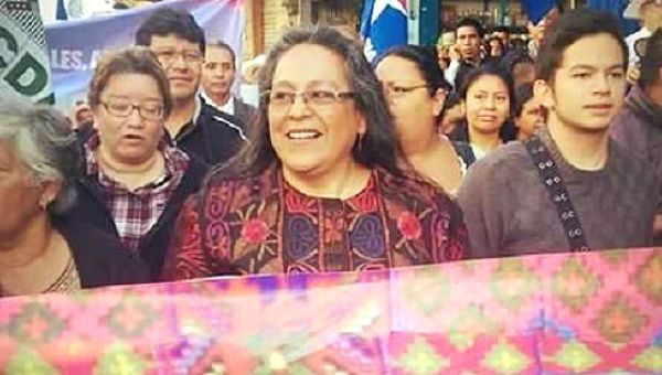 Sandra Moran (C) is a longtime feminist activist and Guatemala's first openly gay lawmaker in Congress. 