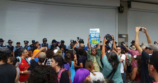The protest forced Walmart to temporarily closed its doors after the police intervened.